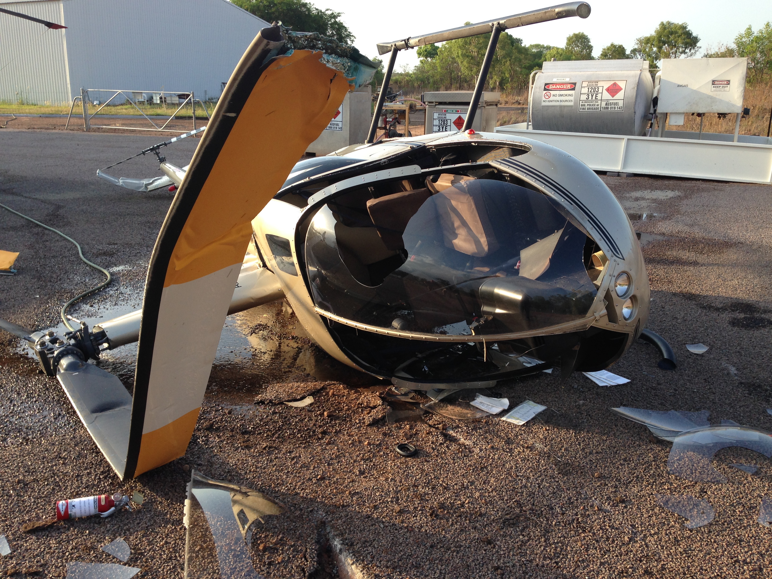 Figure 2: VH-ZWA on right side showing damage to main rotor and cabin
